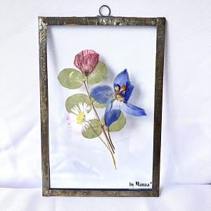 Hanglijstje 10 x 15 met een boeketje van een madelief, klaproos en ridderspoor